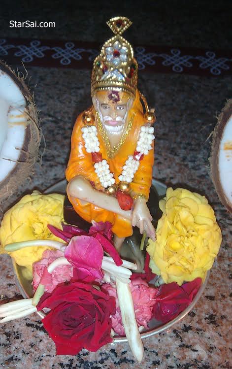 shirdi saibaba pooja offering roses